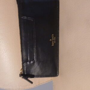 Kate Spade Black Leather Slim Wallet.
